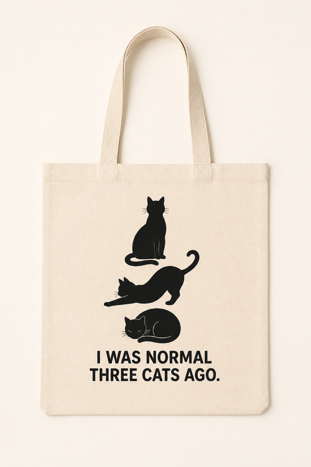 I Was Normal Three Cats Ago. Tote Bag natural canvas tote with one-color black cat design